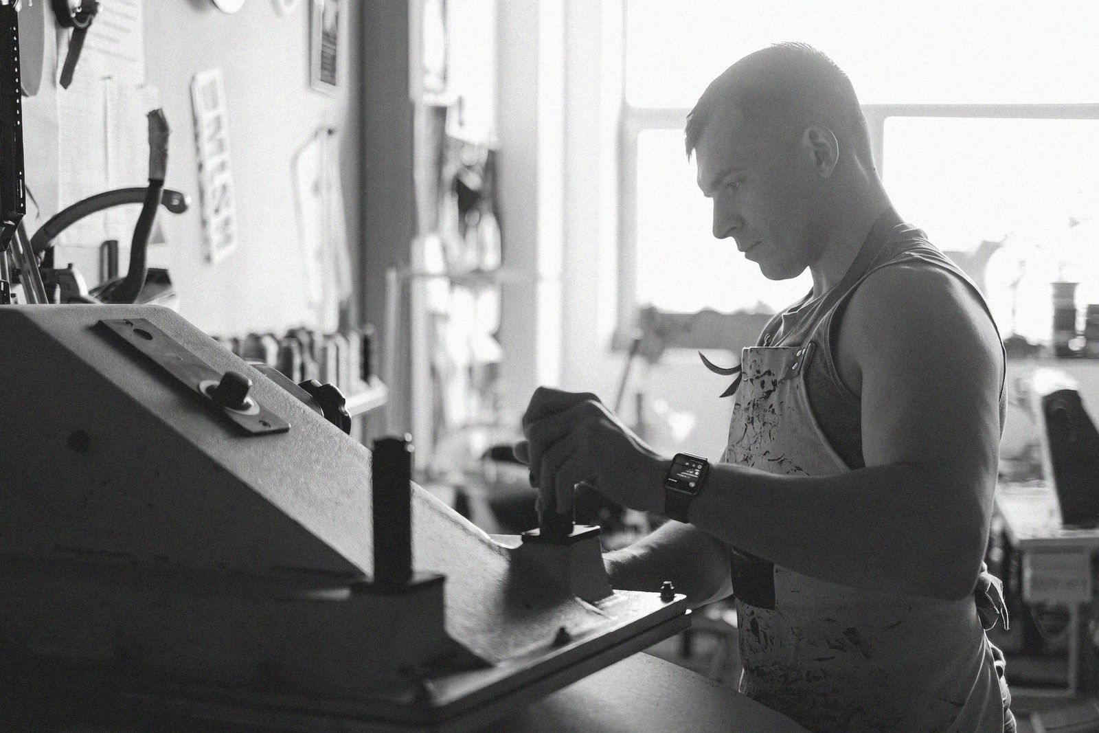 A craftsman at work wearing an Apple Watch